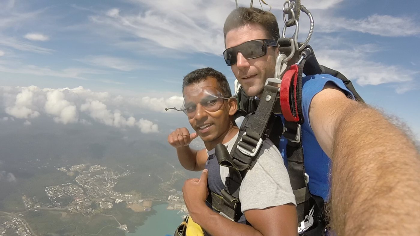 Gin skydiving over the coast in Australia