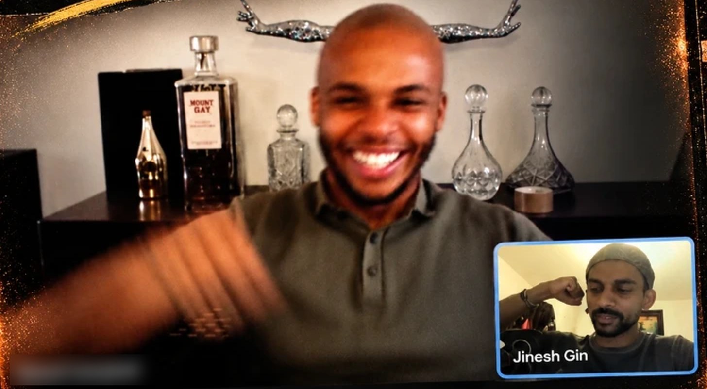 Gin on a video coaching call with a client who is laughing